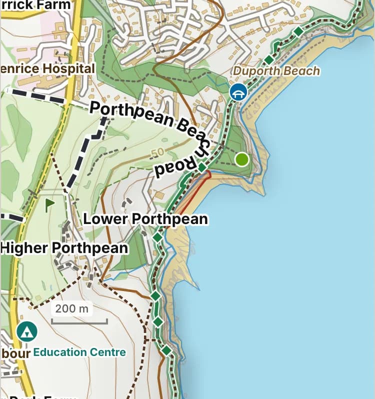 Map of Porthpean Beach: the stretch where dogs are banned 1 July to 31 August is hatched in brick. Beaches we have not placed an order on are outlined in grey dots, and say nothing about dogs.