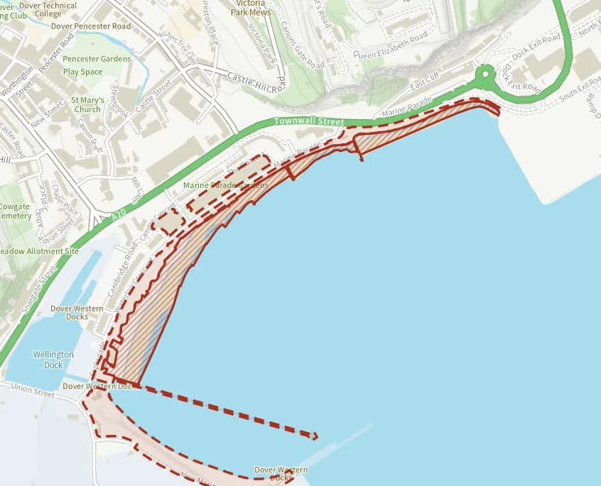 Map of Dover seafront beach: the stretch where dogs are banned 1 May to 30 September is hatched in brick, and the marina curve, promenade and gardens and dover pier, where dogs must be on a lead all year, has a dashed brick edge.
