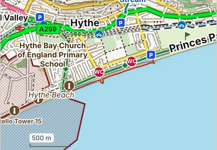 Map of Hythe beach: the stretch where dogs are banned 1 May to 30 September is hatched in brick, and the promenade, where dogs must be on a lead 1 May to 30 September, has a dashed brick edge. Beaches we have not placed an order on are outlined in grey dots, and say nothing about dogs.