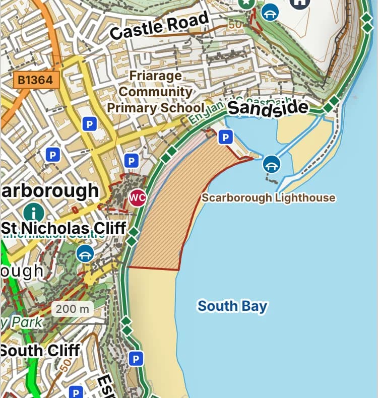 Map of South Bay: the stretch where dogs are banned 1 May to 30 September is hatched in brick, and south bay promenade by the spa, where dogs must be on a lead all year, has a dashed brick edge.